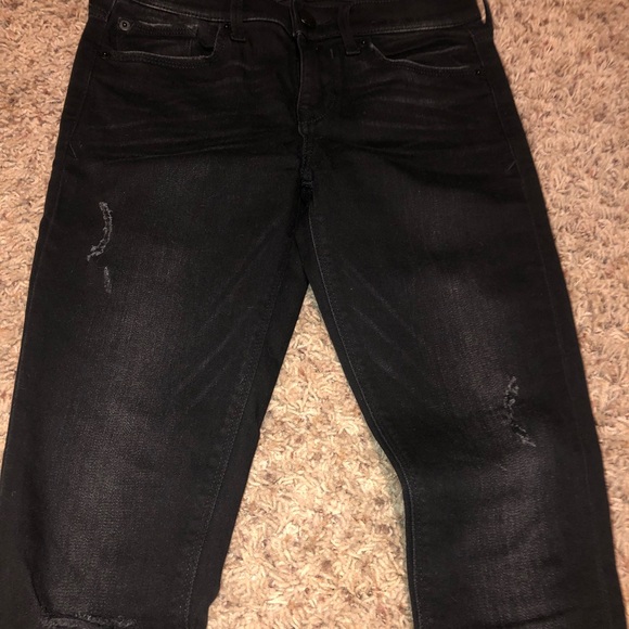 Distressed mid-rise denim